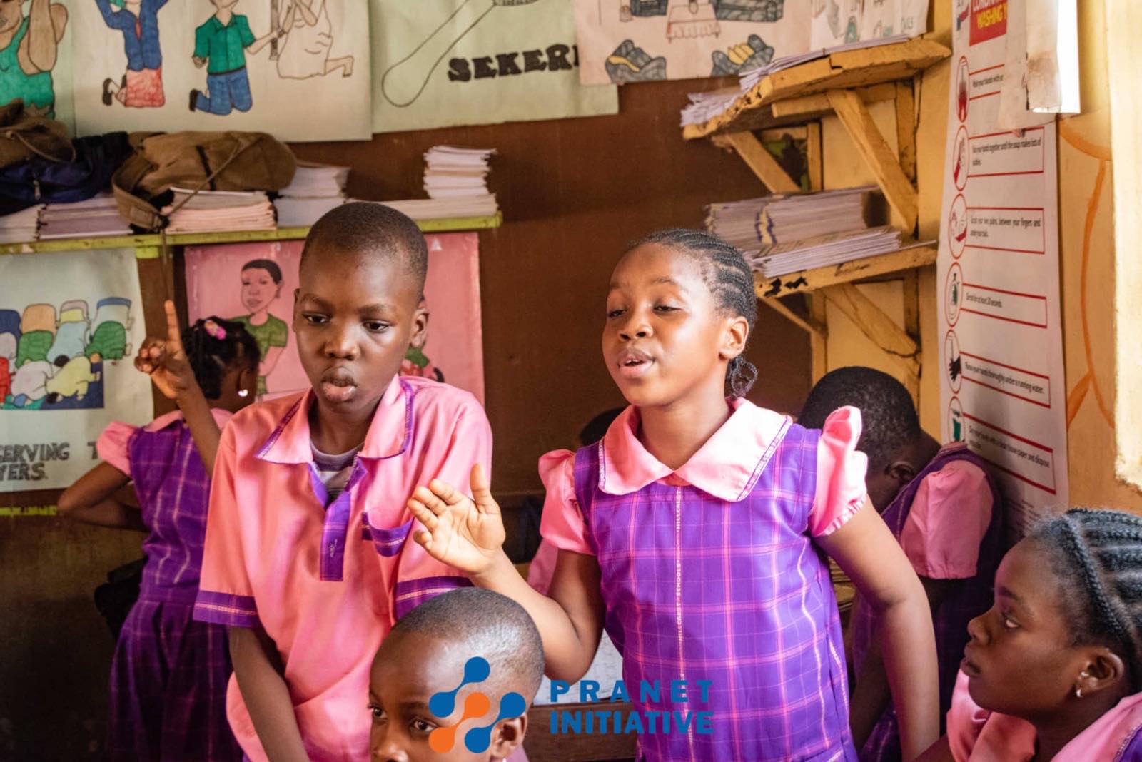 Two pupils standing to answer during a lesson