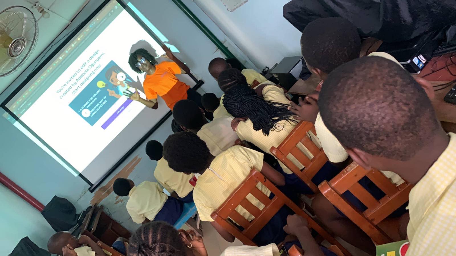 Pupils watching a lesson on screen