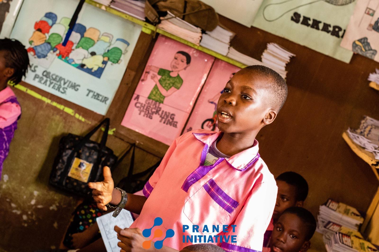 A pupil presenting to her class